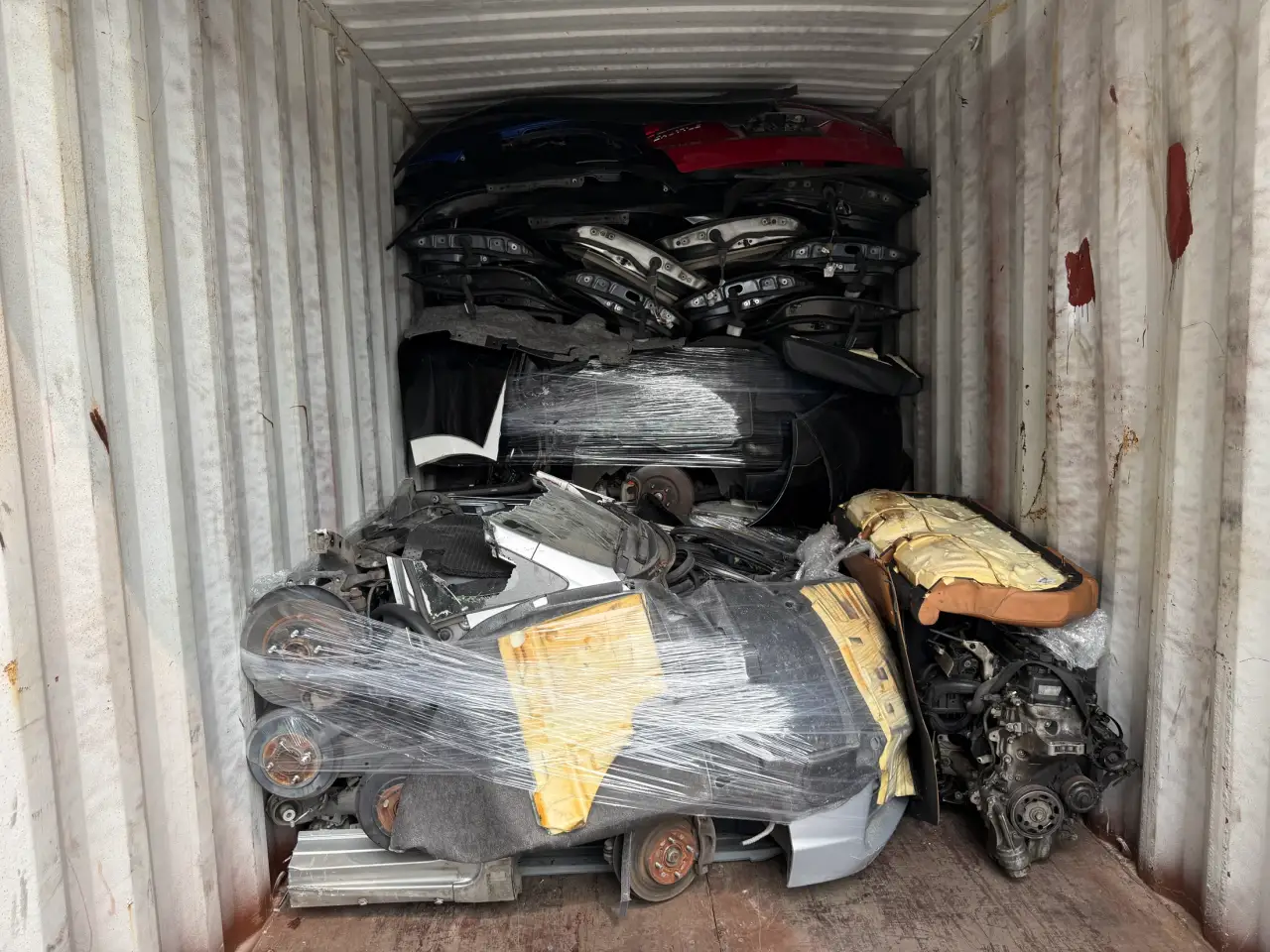 Vehicle sections packed inside a shipping container
